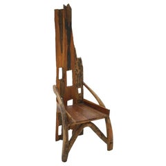 Chaise française sculpturale du milieu du siècle en bois d'olivier et en noyer, années 1940