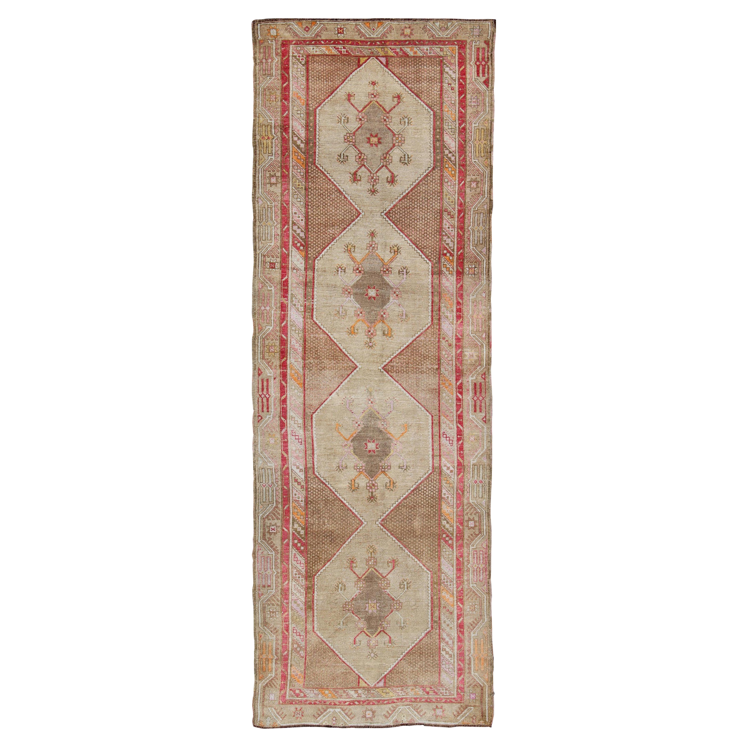 Turkish Oushak Gallery Rug with Multi-Medallion Design in Earth Tones and Red For Sale