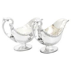 Pareja victoriana de salseras de plata de ley