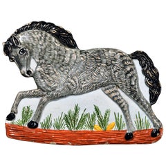 Faience Plaque in the Form of a Horse, circa 1840
