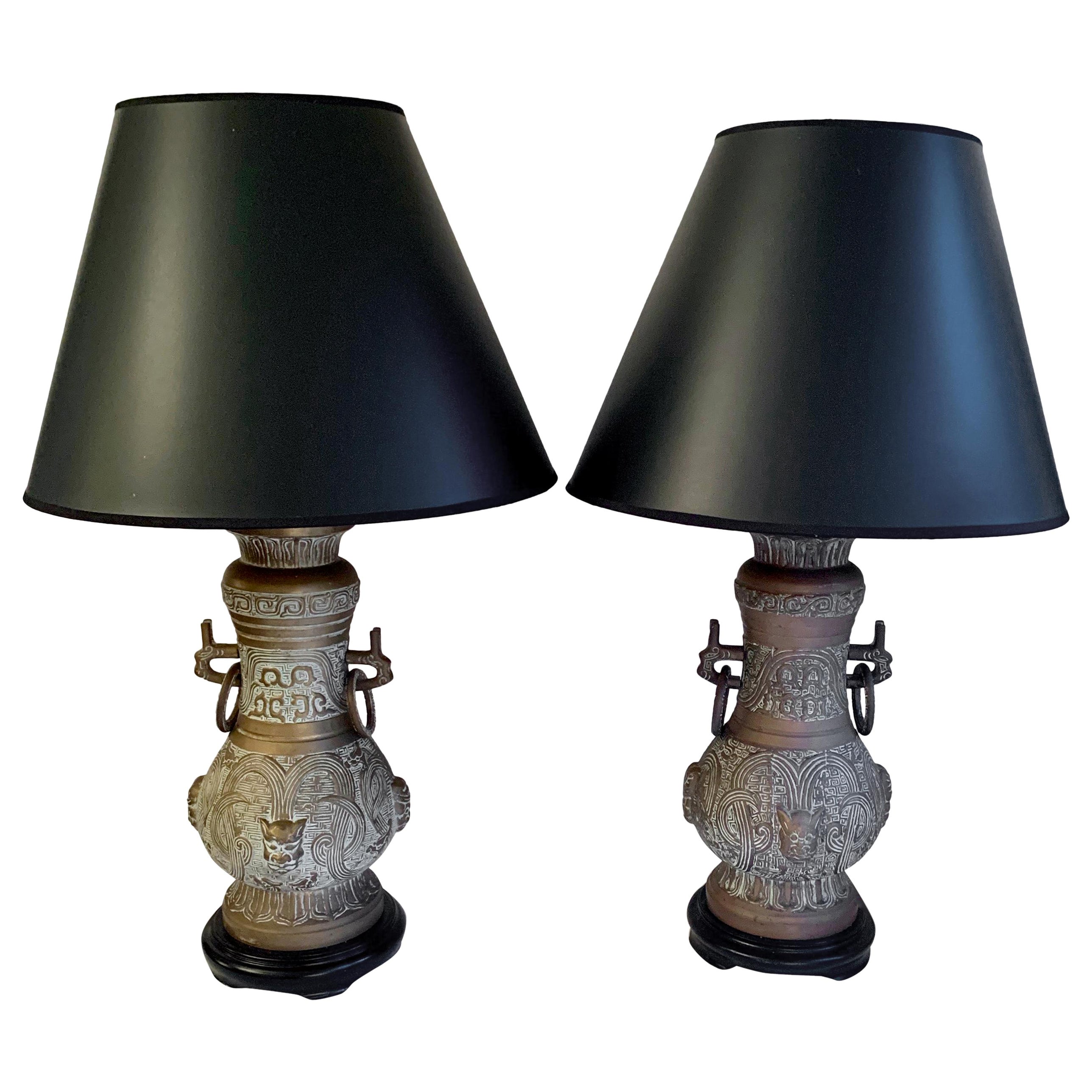 Pair of James Mont Style Bronze Urn Lamps For Sale
