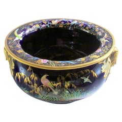 Large French 19th Century Ceramic Jardiniere with Enameled Birds and Butterflies