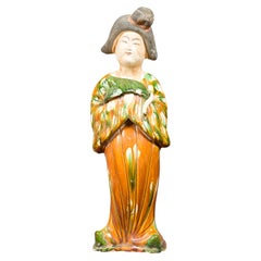 Court Lady Statue with Egg and Spinach Pattern Kimono and Holding a Dog