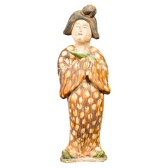 Statue of a Court Lady Wearing Brown Patterned Kimono and Holding a Baby