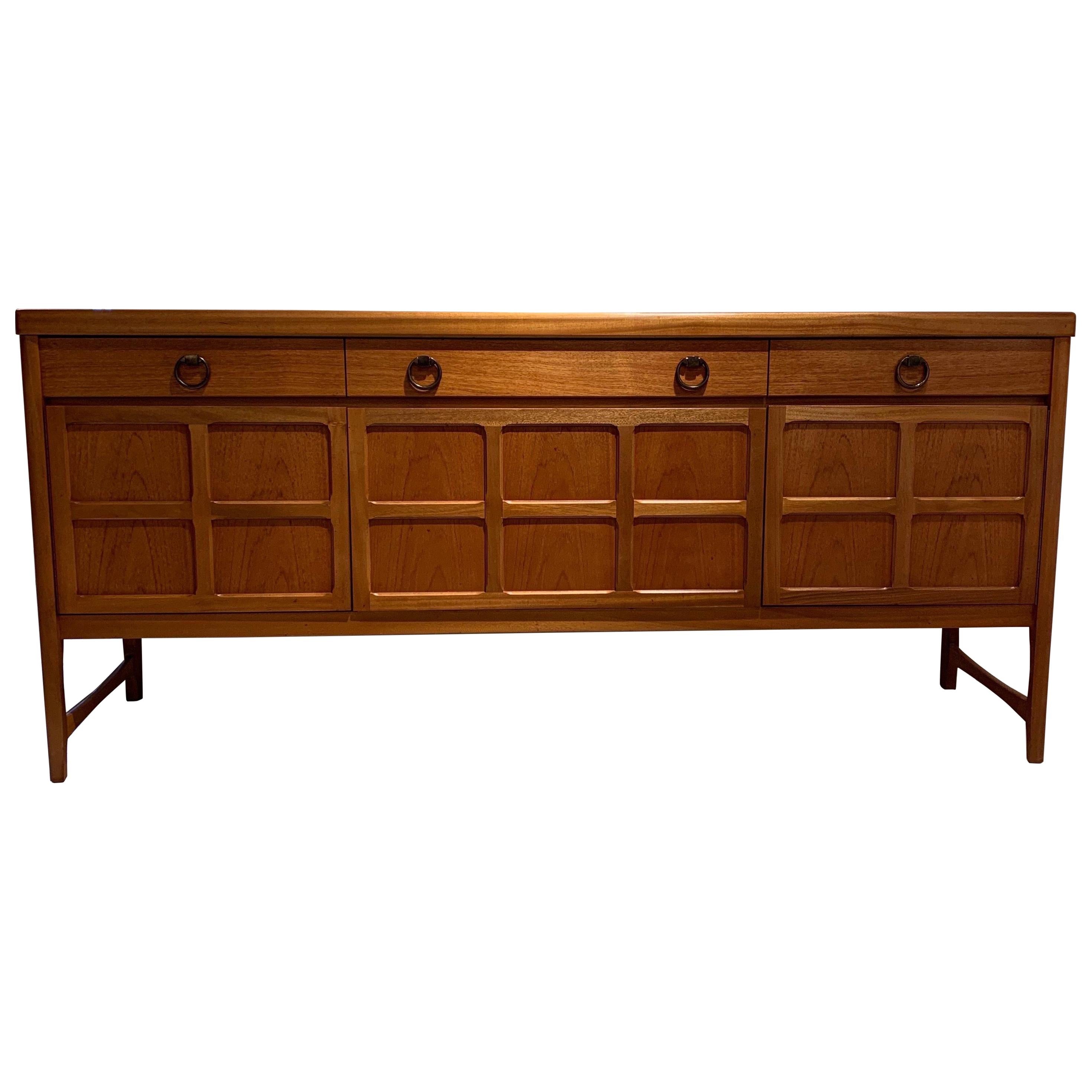 Nathan Furniture is English company that created some interesting piece of furniture in the 1970s. This elegant teak sideboard is example of their work. There three drawers and three bottom cupboards. Those furniture are elegant and durable quality.