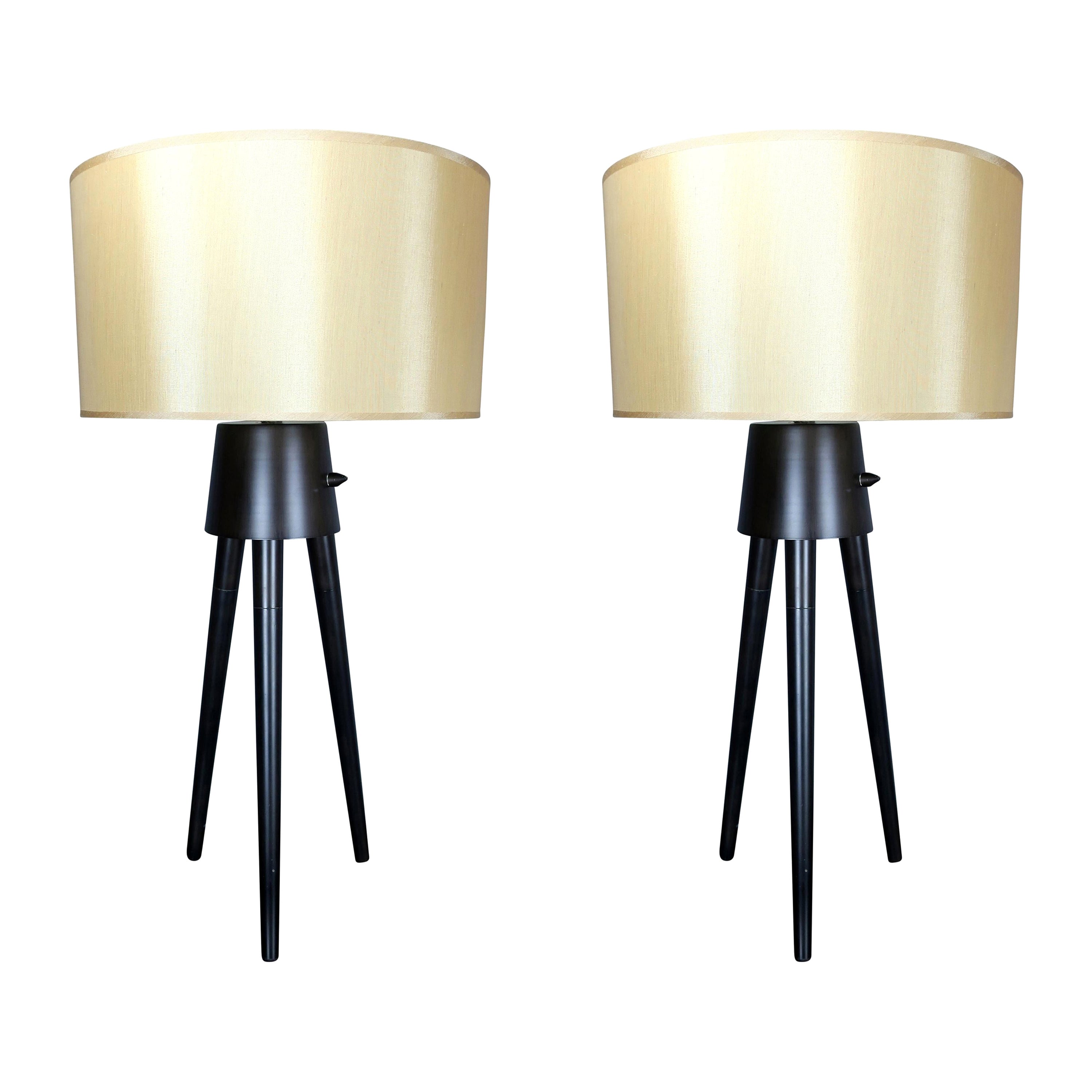 Pair of Midcentury Style Black Tripod Lamps with Champagne Shades For Sale