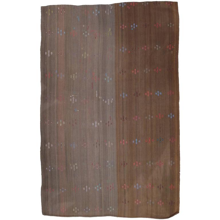 Brown Kilim with Colorful Motifs For Sale at 1stdibs