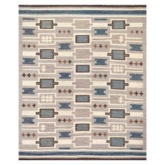Tappeto contemporaneo a tessitura piatta in stile svedese intrecciato a mano, di colore grigio, bianco e blu.