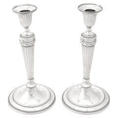 Candeleros ingleses georgianos de plata de ley