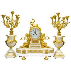 Louis XVI Style Gilt Bronze and White Marble Candelabra and Clock Garniture