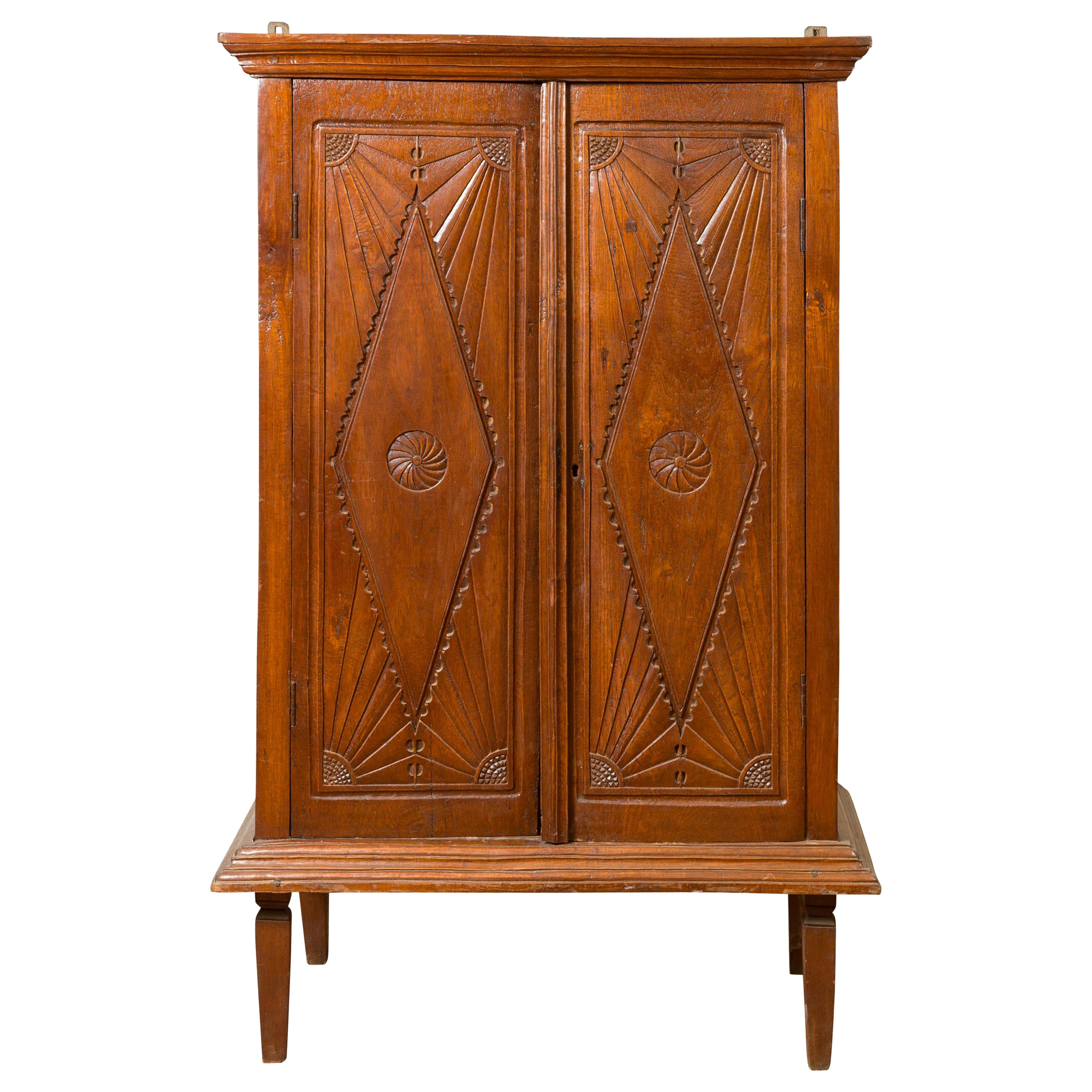 Dutch Colonial Carved Wooden Cabinet with Diamonds and Radiating Motifs For Sale