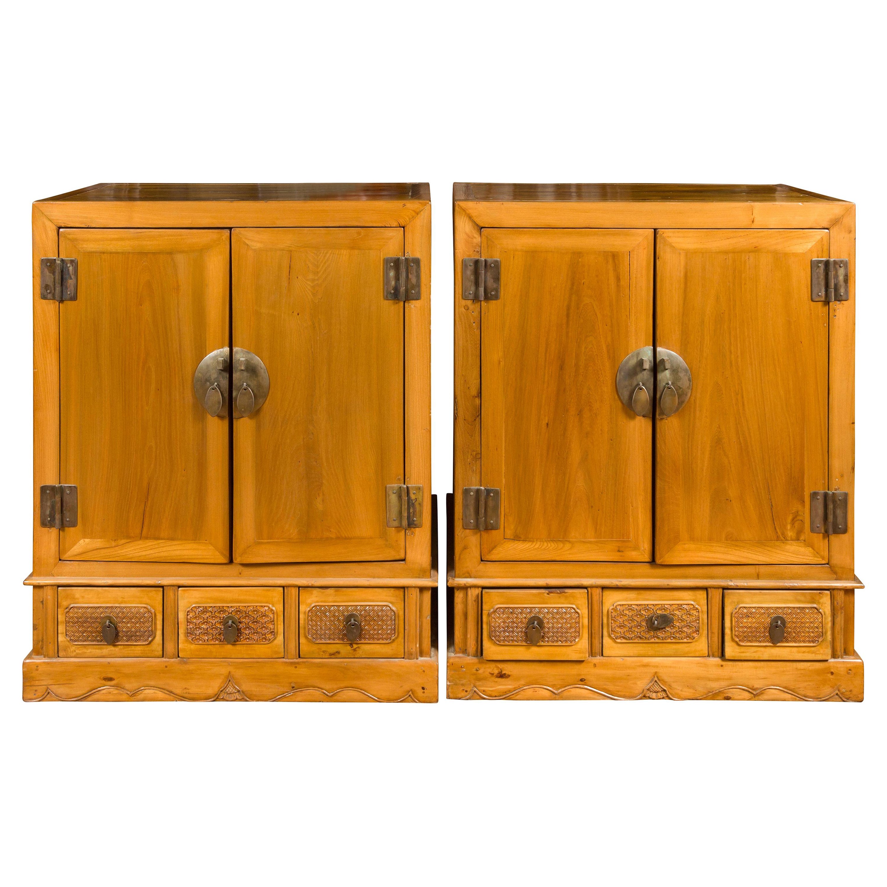 Pair of Chinese Qing Dynasty Carved Yumu Wood Cabinets with Doors and Drawers