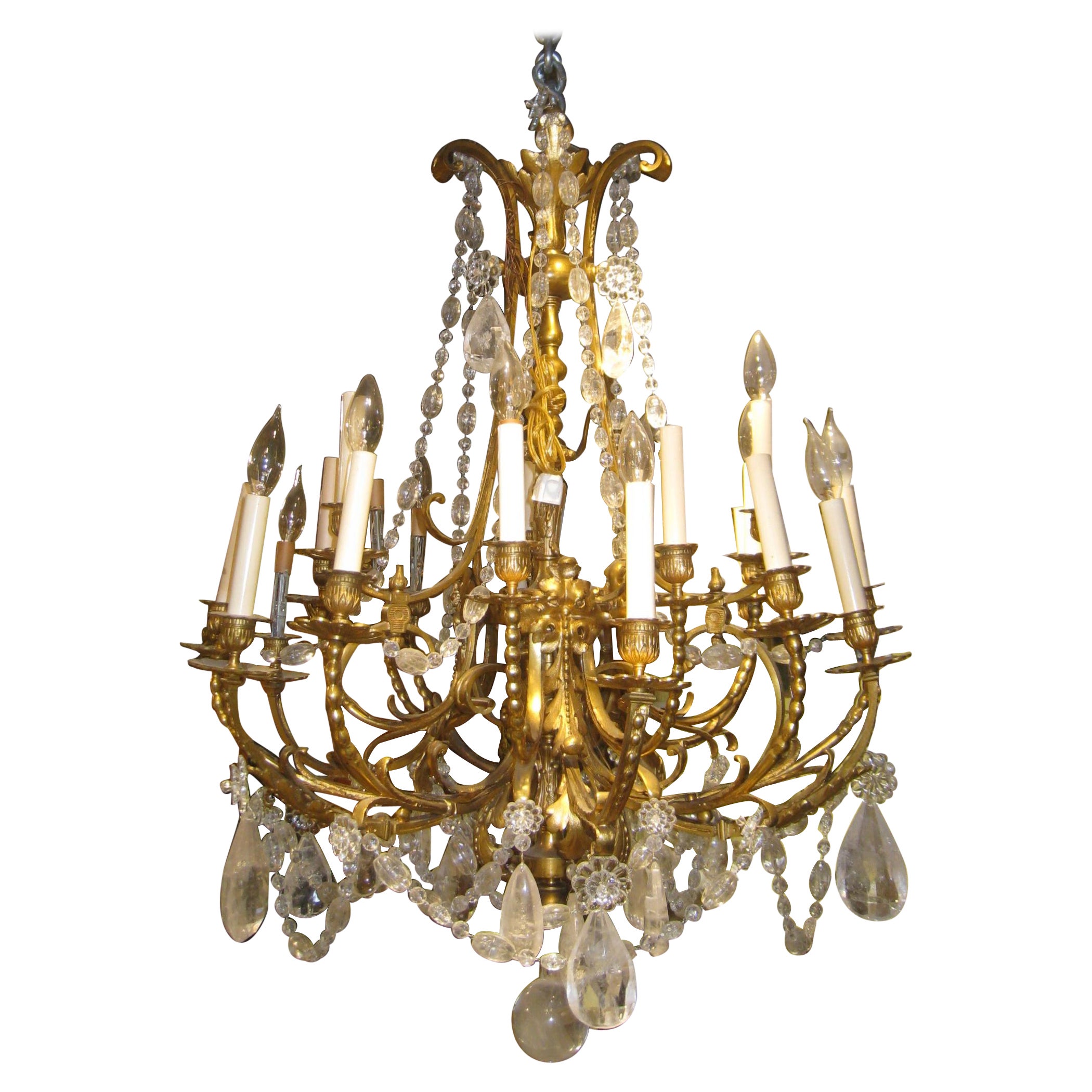 French 19th C Louis XV XVI Style 16 Light Bronze Chandelier with Rock Crystal For Sale