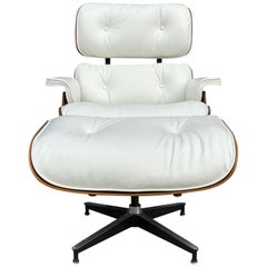 Herman Miller Eames Rosewood Lounge Chair and Ottoman with New White Leather