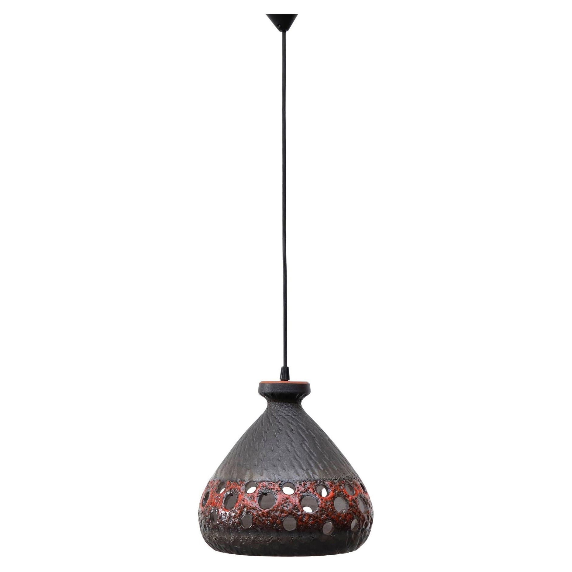 1970s Ceramic Bell Shaped Red and Gray Lava Glaze Pendant Light with Cut-Outs