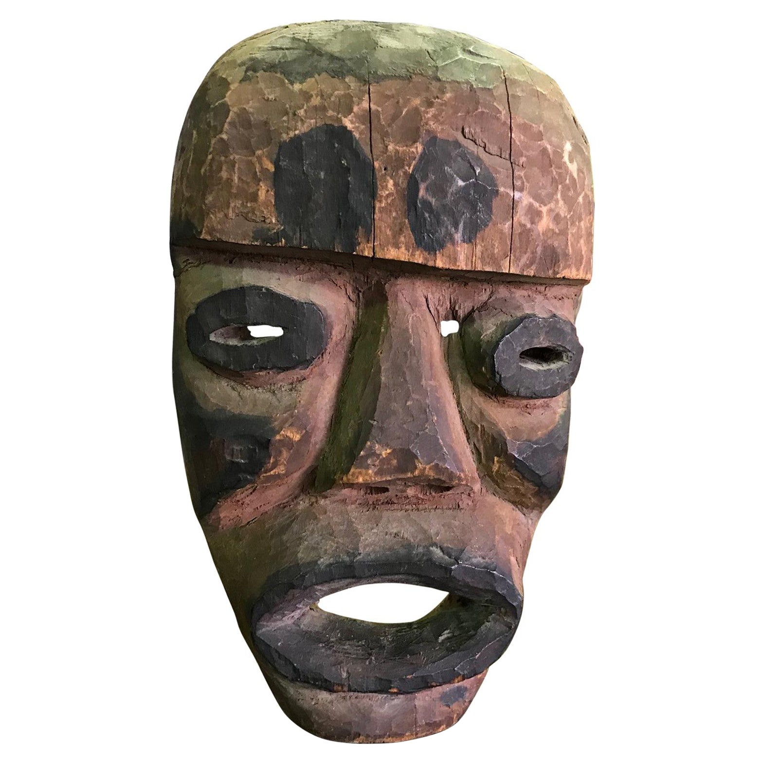 Hand Carved Wood Painted and Pigmented Primitive Tribal Mask For Sale