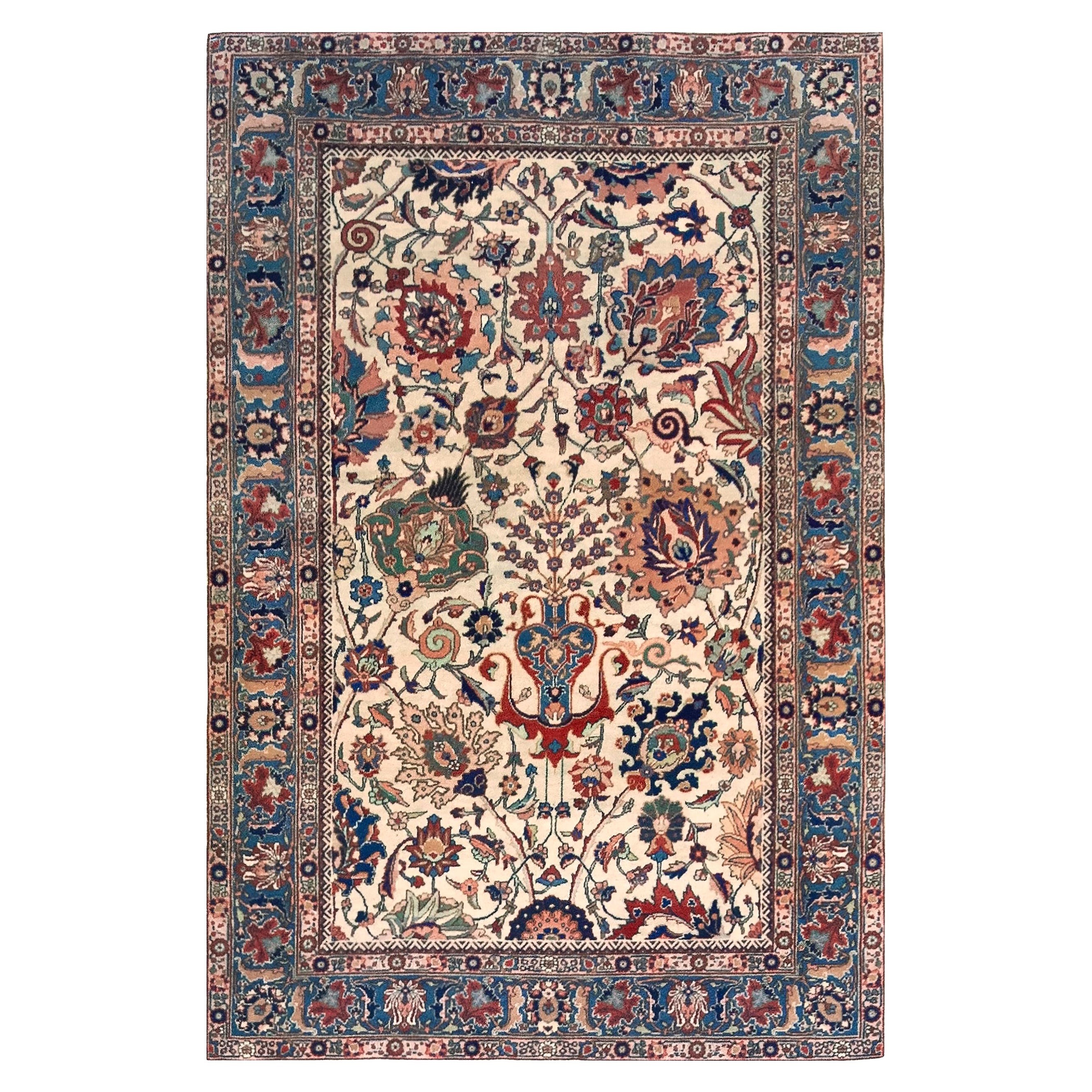 Tabriz persiano in lana intrecciata a mano con motivi floreali multicolore, circa fine XIX secolo in vendita