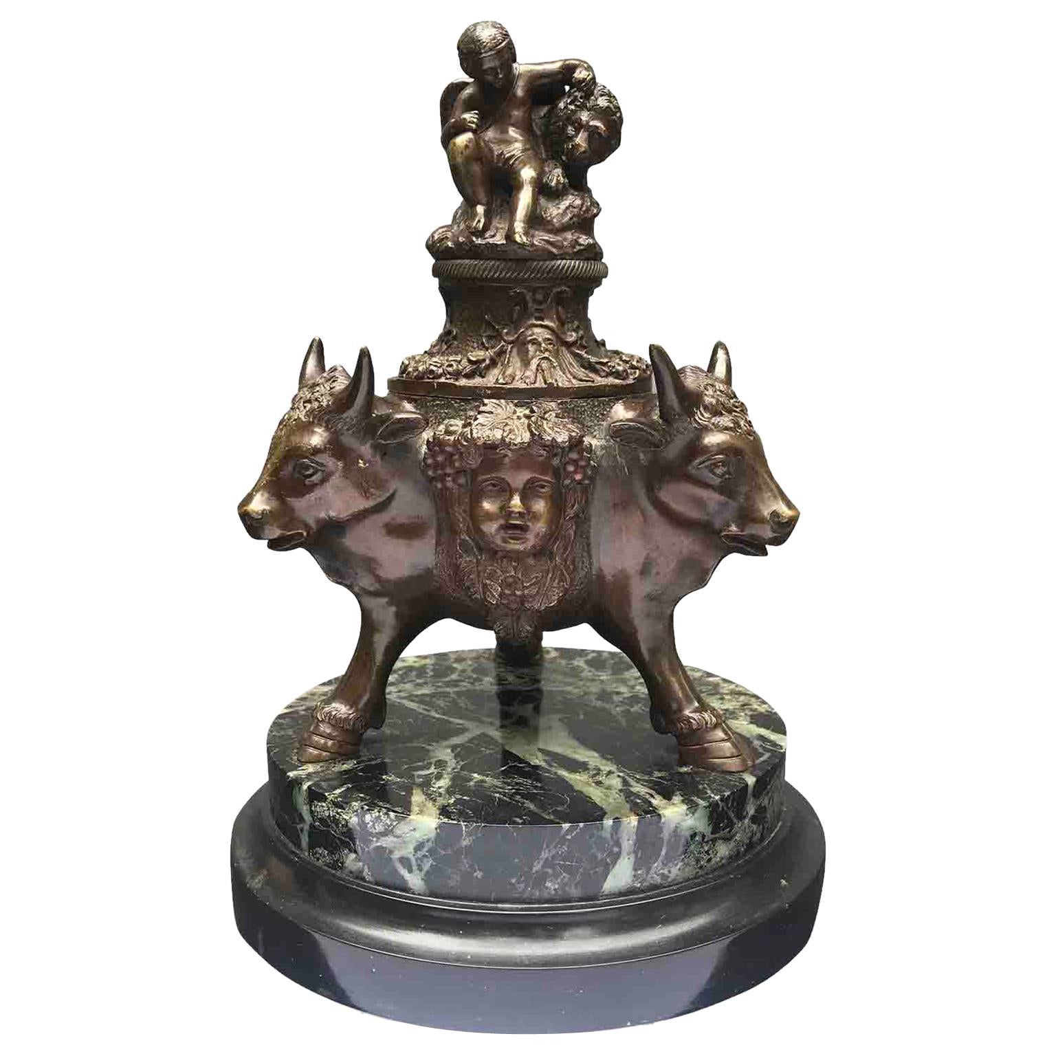 20th Century Italian Bronze Inkwell with Bull Heads and Putti Embracing Lion For Sale