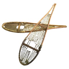 Pair of Native American Rawhide Pom Pom Snowshoes, Late 19th-Early 20th Century