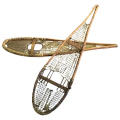 Pair of Native American Rawhide Pom Pom Snowshoes, Late 19th-Early 20th Century