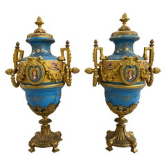 19th Century Pair of French Sevres Celeste Blue Porcelain Urns with Gilt Ormolu