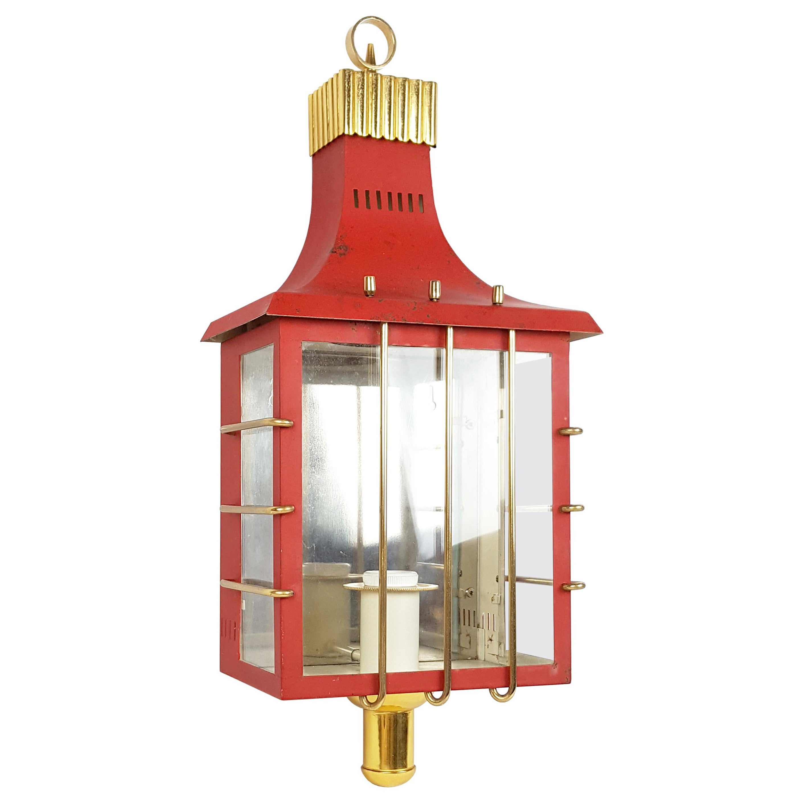 Applique italiana del Medioevo in metallo rosso, vetro e ottone