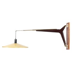 20th Century Yellow Italian Adjustable Reading Walnut Wall Lamp by Stilnovo