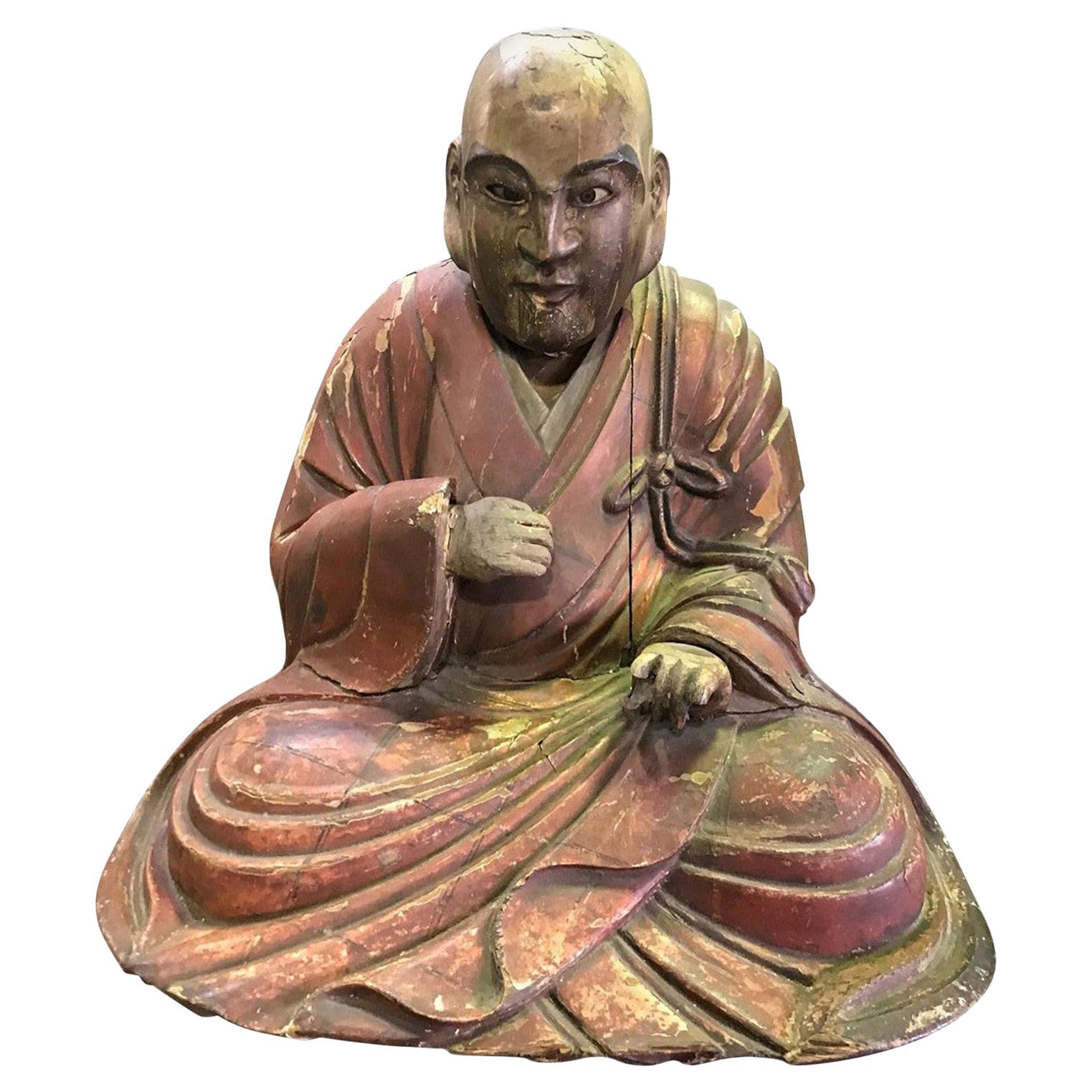 Sculpture japonaise polychrome en bois sculpté d'un moine de temple assis, période Edo