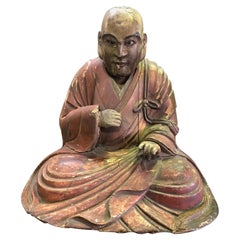Sculpture japonaise polychrome en bois sculpté d'un moine de temple assis, période Edo