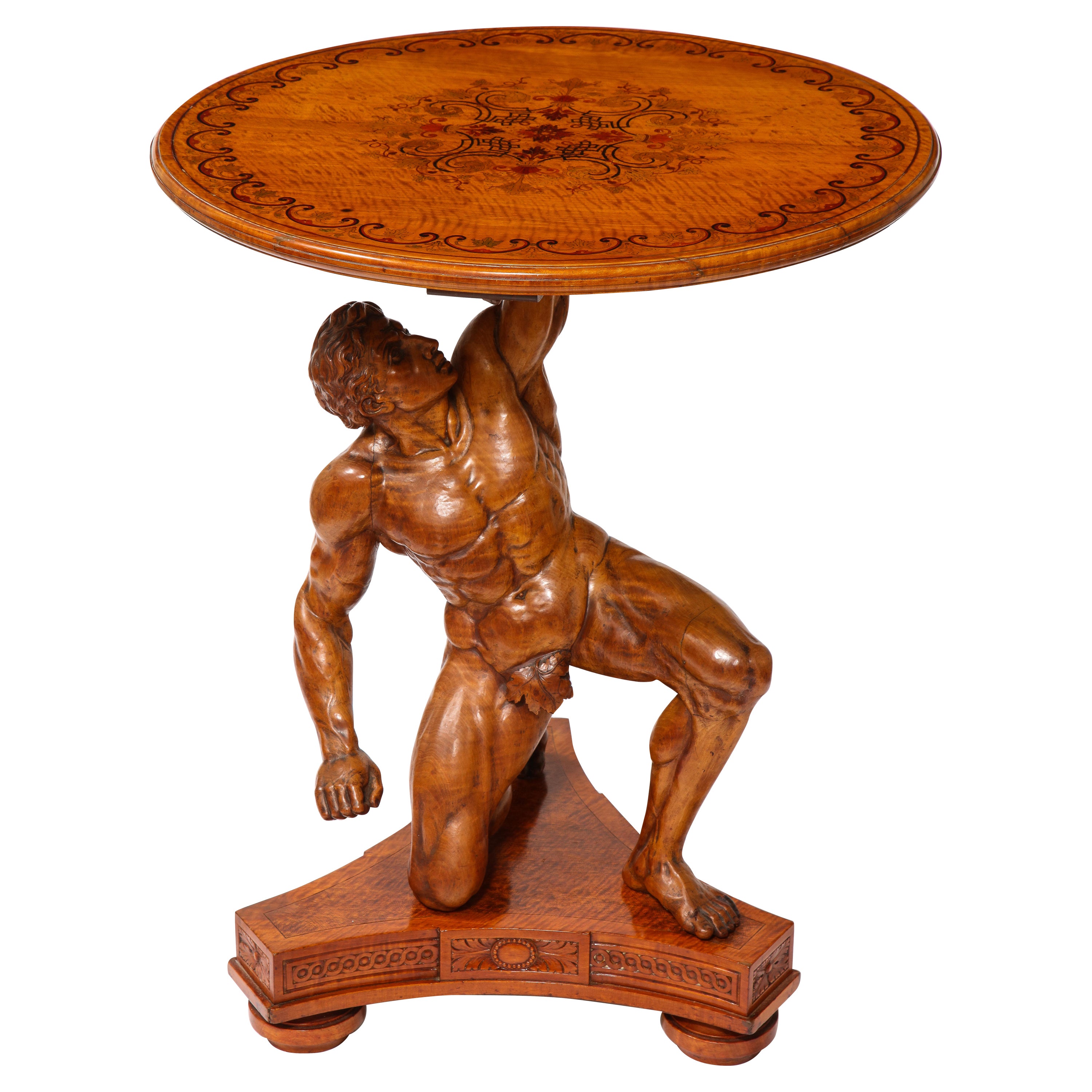 Table centrale Atlas en marqueterie de bois sculpté du 19e siècle, signée J. Plucknett & Co.