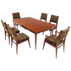 Table de salle à manger avec trois rallonges et six chaises assorties