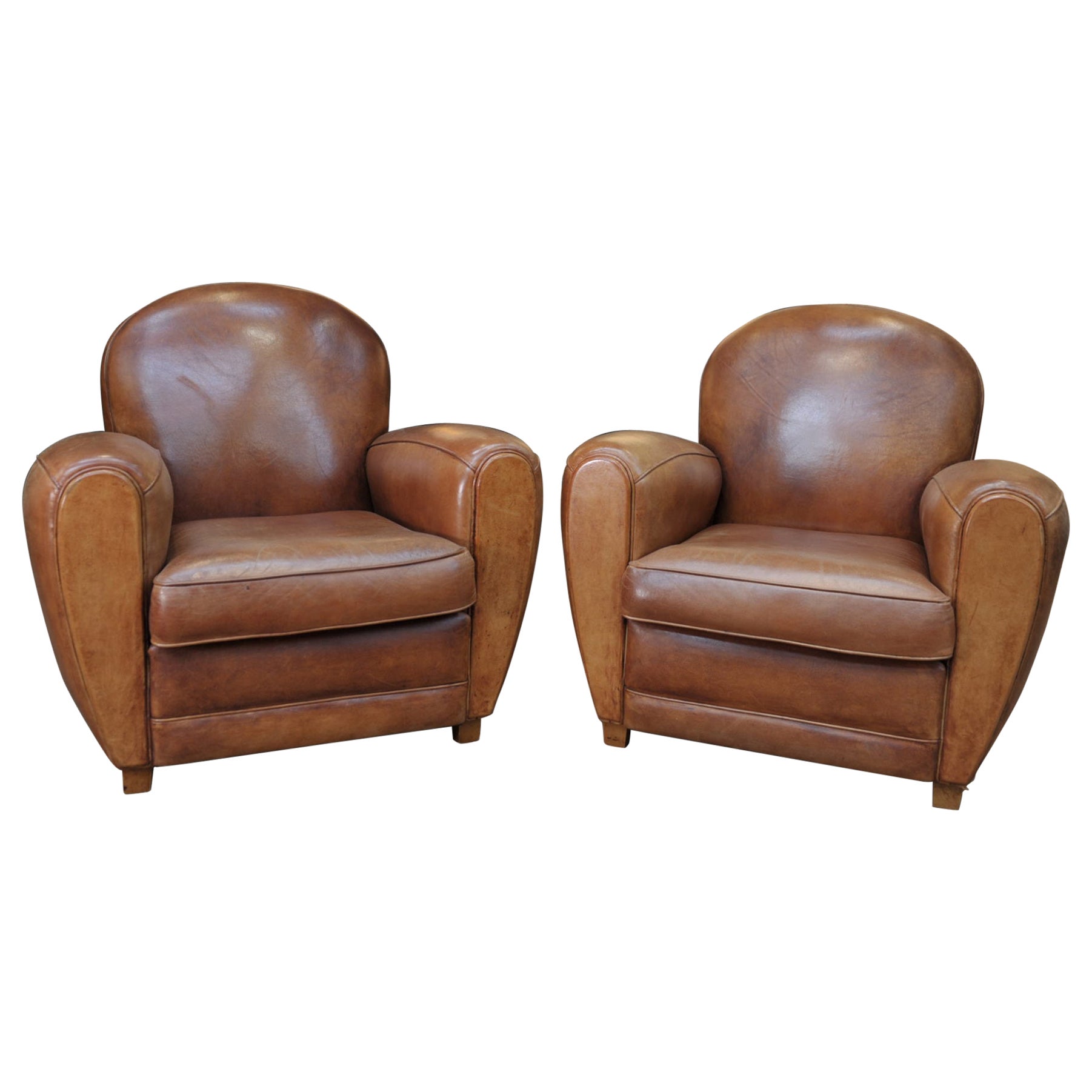 Pair of Custom Leather Club Chairs in a Butter Soft "cafe au lait