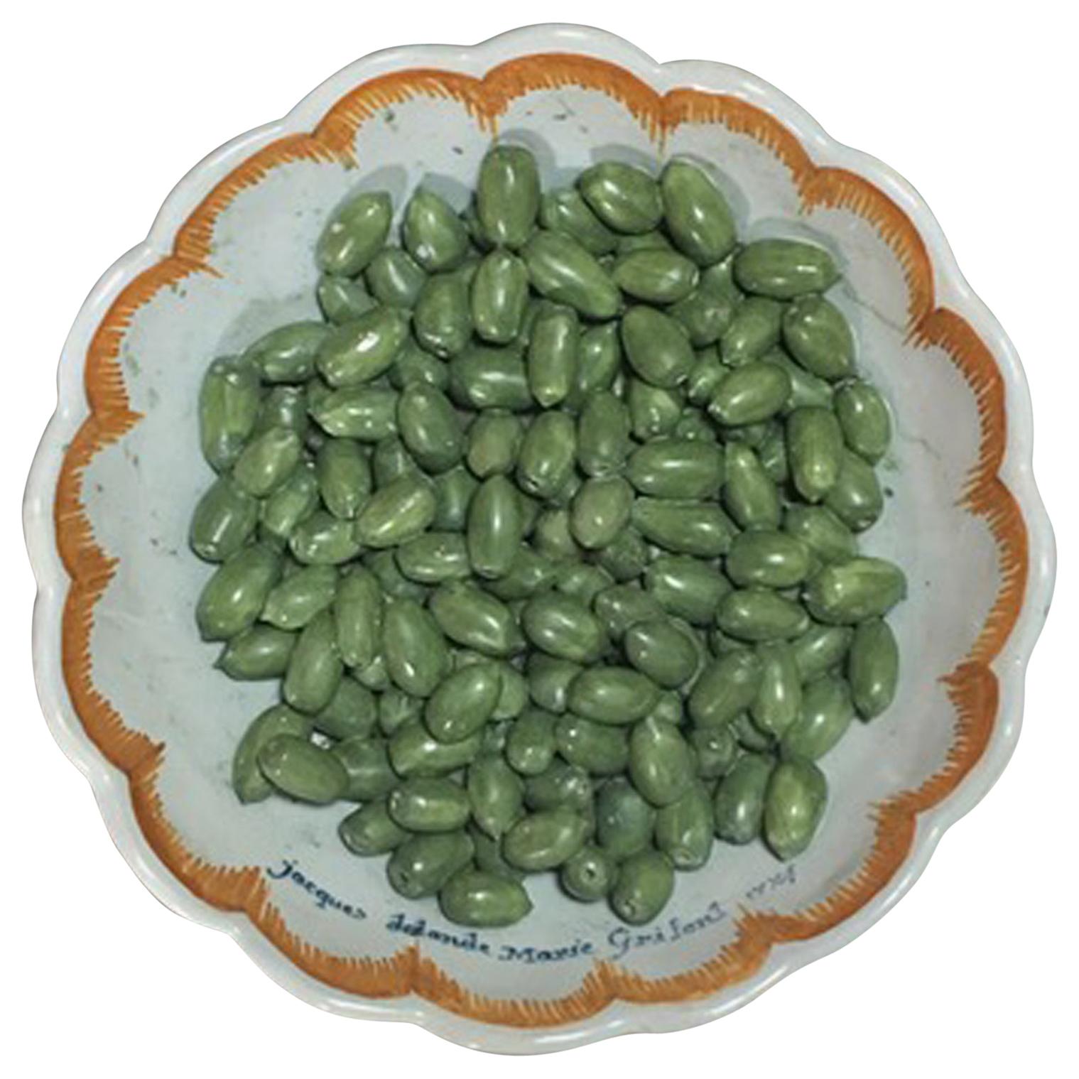 French Faience Tromp L'oeil Bowl with Olives, Nevers, Dated 1774