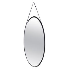 Oval Vintage Wall Mirror with Ebonized Wood Frame and a Leather Hook, Italy