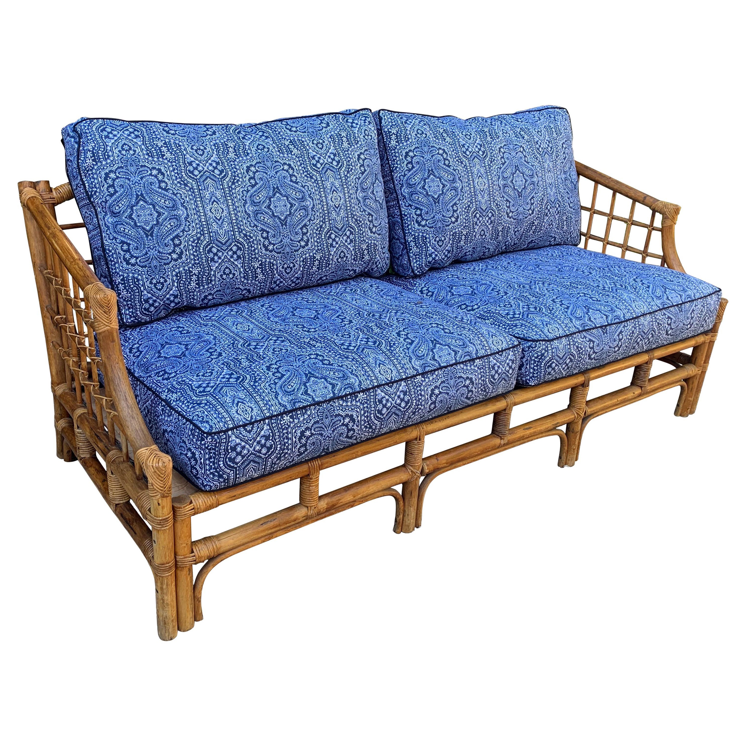 Rattan Sofa with Blue Upholstery For Sale