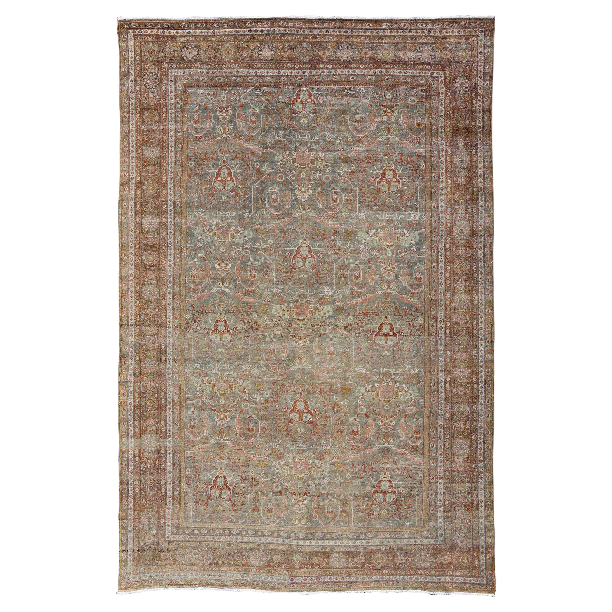 Antique Persian Distressed Sultanabad Rug in Grey Background, Blue, Green, Red For Sale