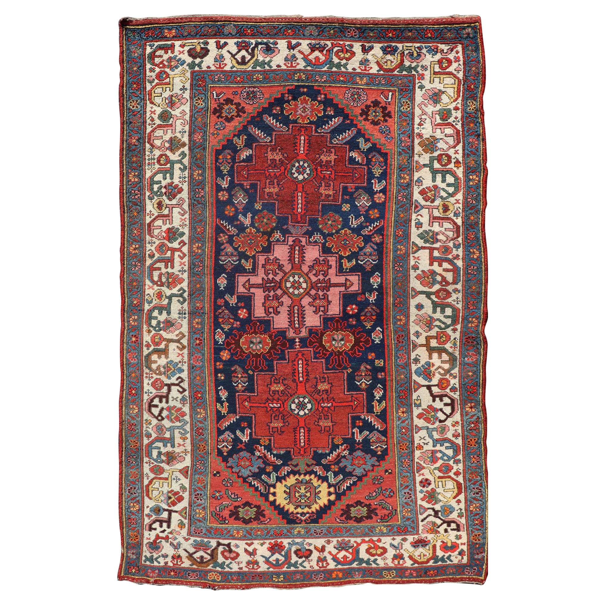 Fine Antique Persian Kurdish Rug with Medallion Design in Blue, Red, and Ivory For Sale