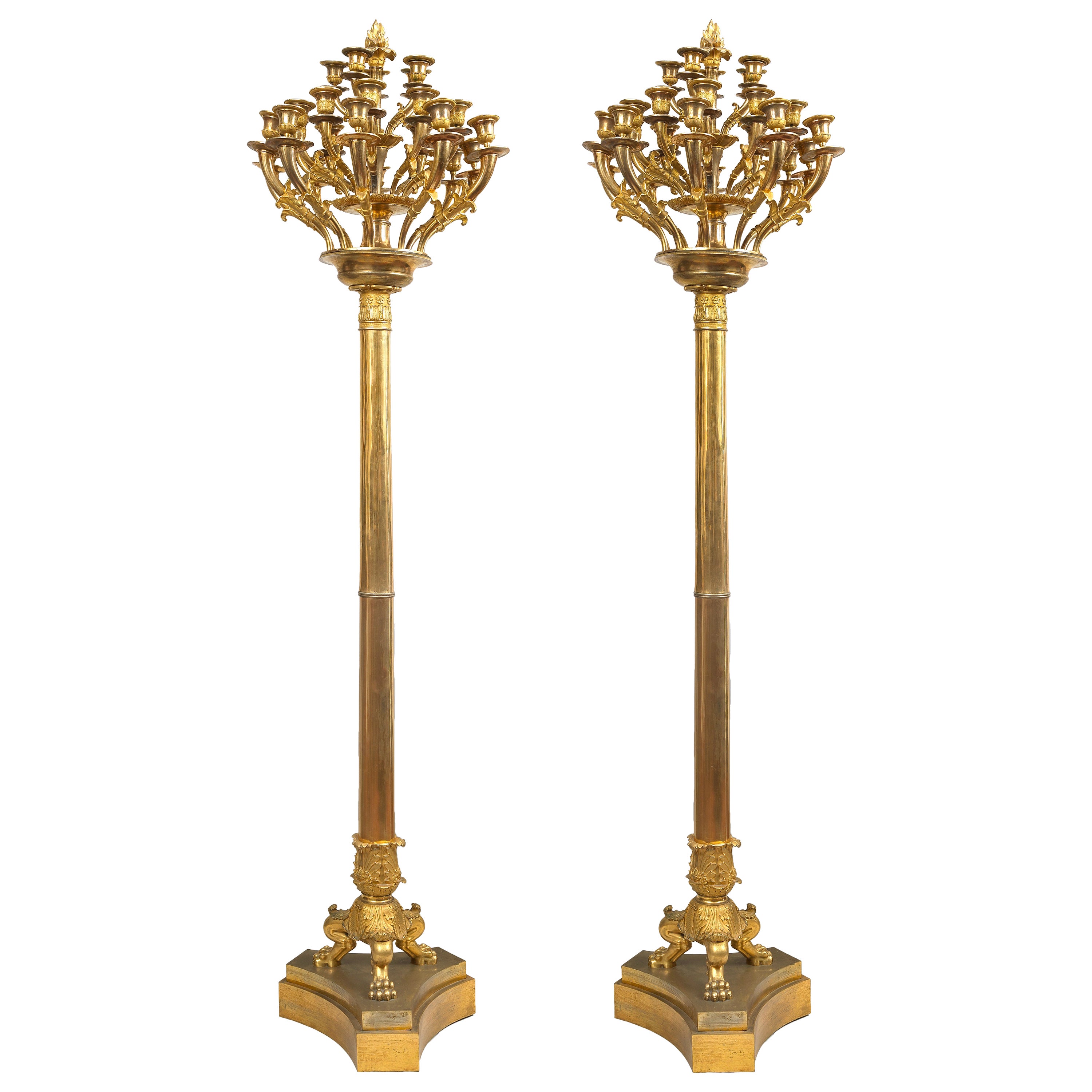 Pair of Monumental Gilt Bronze and Glass Floor Standing Candelabra For