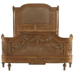 Turn of the Century French Louis XVI Style Carved Walnut and Cane Bed 1