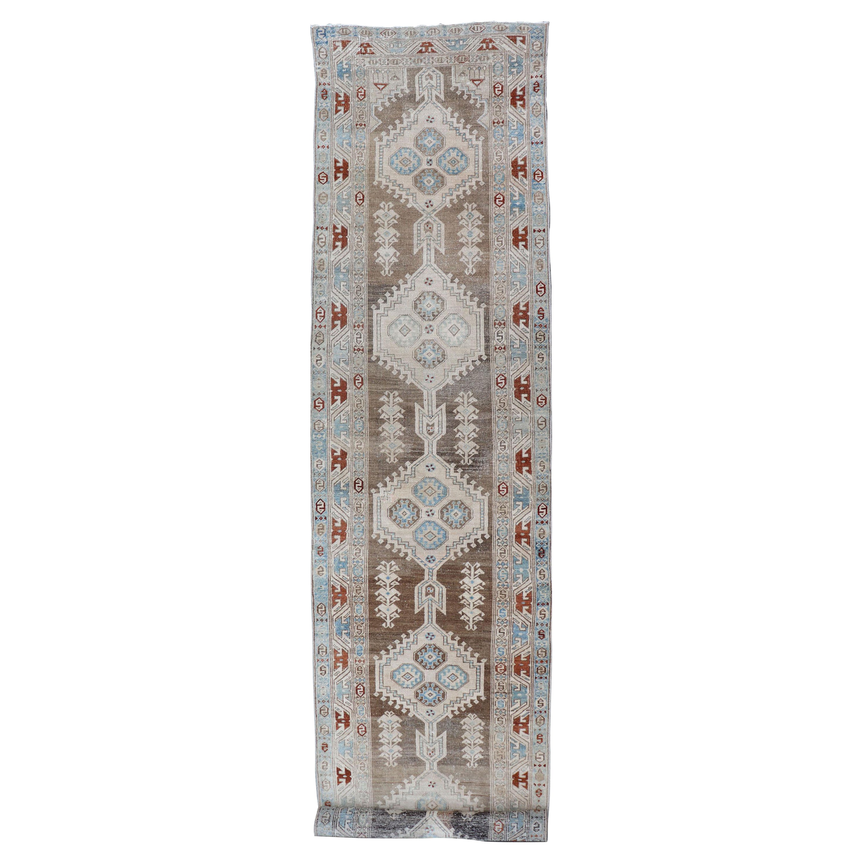 Long Persian Heriz Runner with Central Medallions in Brown, Blue, Tan & Red For Sale