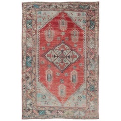 Antique Oushak in Rust, Green, Light Blue, Taupe, Brown, Teal and Silver Colors
