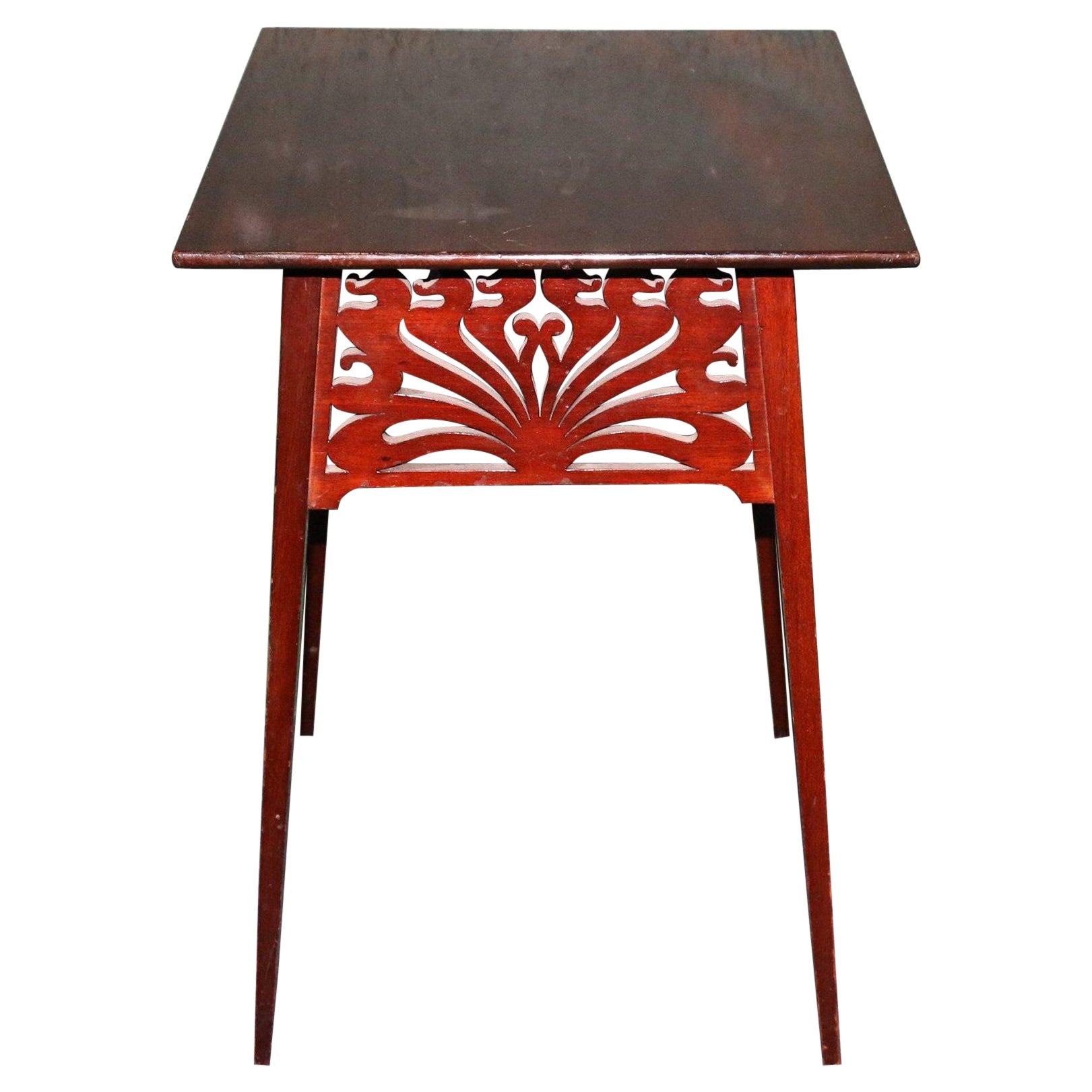 Liberty & Co, in the Style of A H Mackmurdo, an Art Nouveau Mahogany Side Table