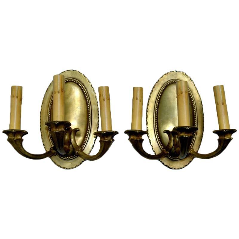 Pair of Neoclassic Oval Sconces For Sale