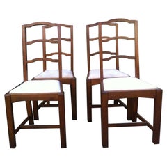 Heals, Set of Four English Arts & Crafts Oak Arched Top Ladderback Dining Chairs