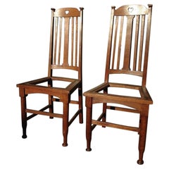 Liberty & Co Four English Arts & Crafts Oak Dining Chairs with Heart Cut-Outs