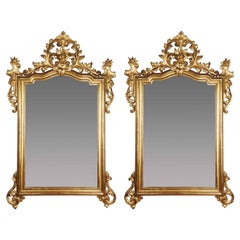 Paire de miroirs italiens en bois doré du 19ème siècle sculptés de style Louis Philippe napolitaine