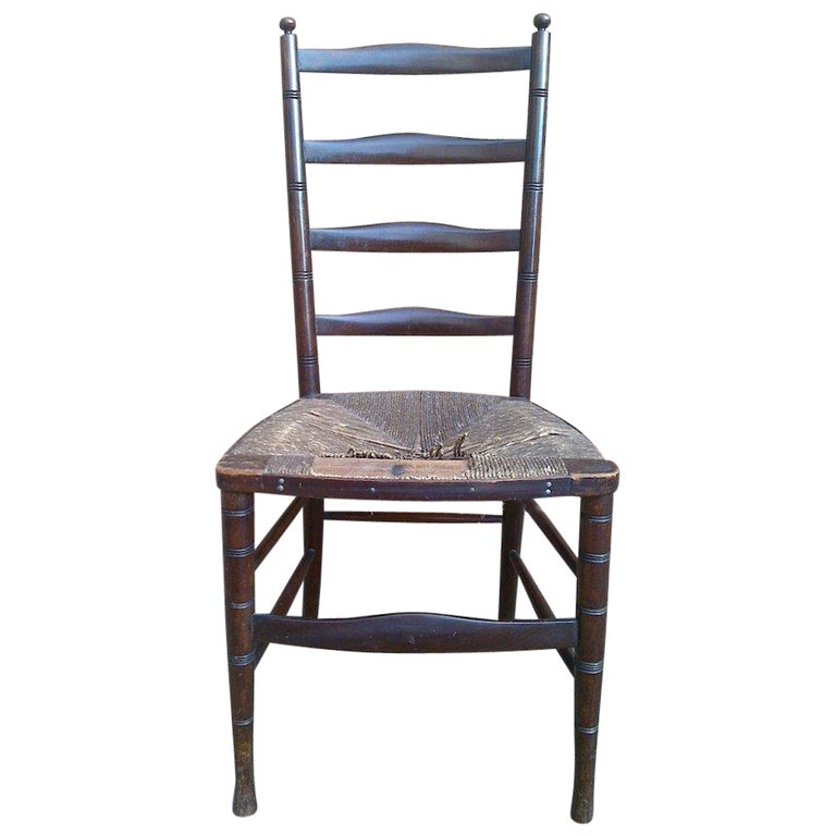 Liberty & Co. an English Aesthetic Movement Walnut Ladder Back Side Chair For Sale