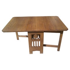 Liberty & Co. Voysey Style, an English Arts & Crafts Oak Drop Leaf Dining Table