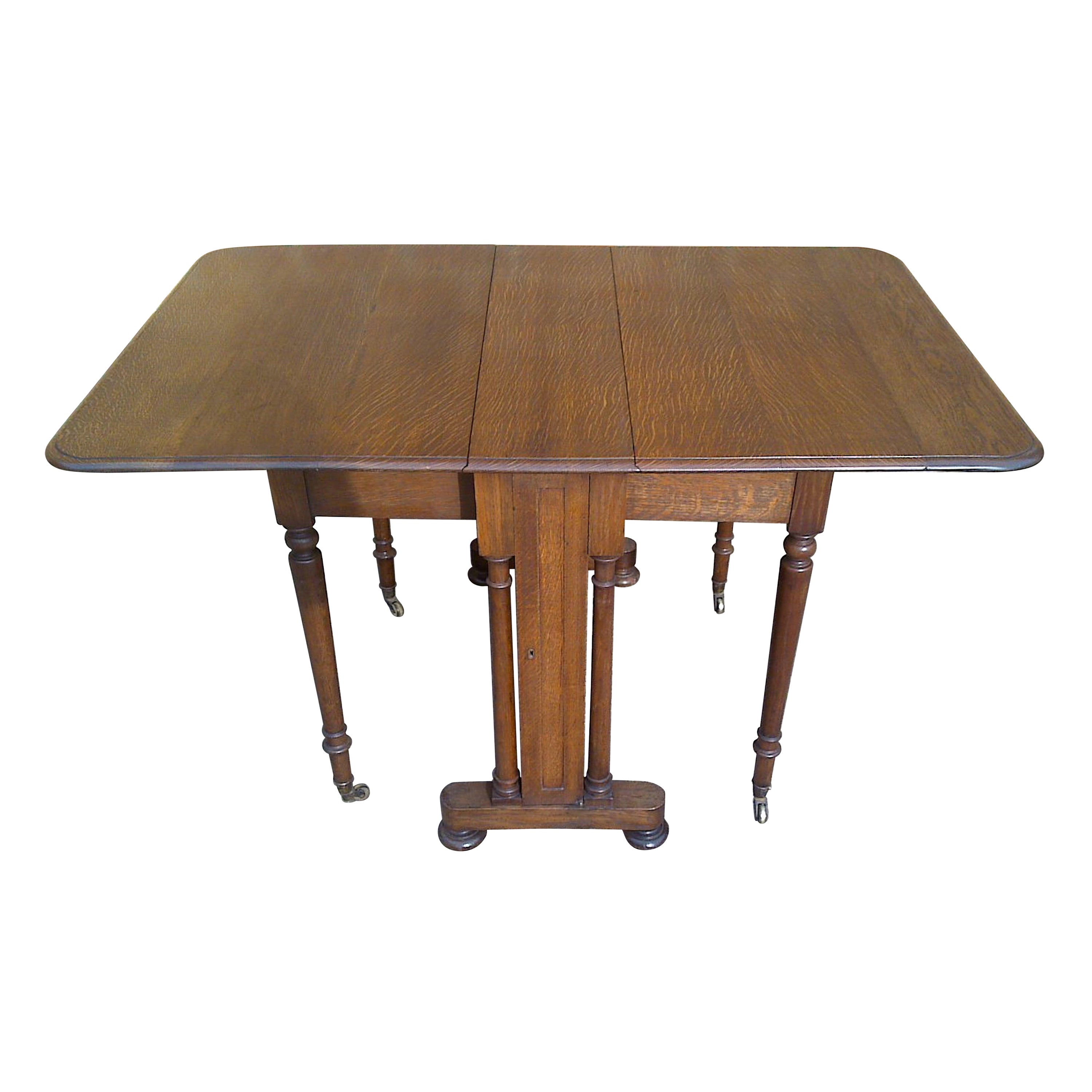 C Hindleys 134 Oxford St. London, a Quality Drop Leaf Victorian Oak Dining Table