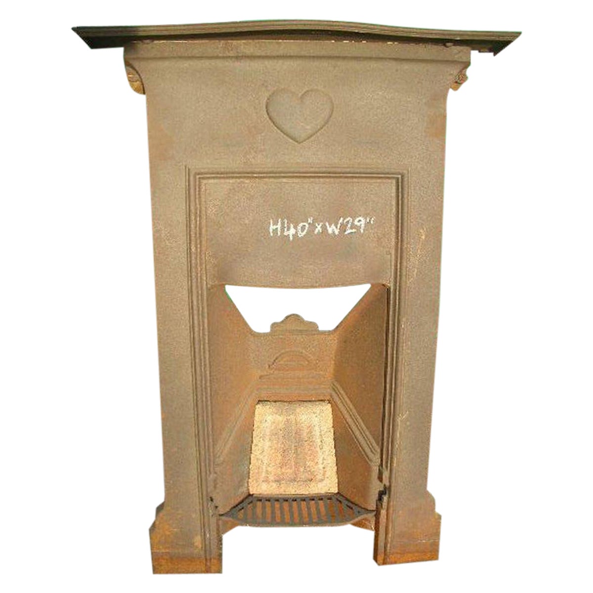 CFA Voysey Attributed, an Arts and Crafts Cast Iron Fireplace with Simple Heart